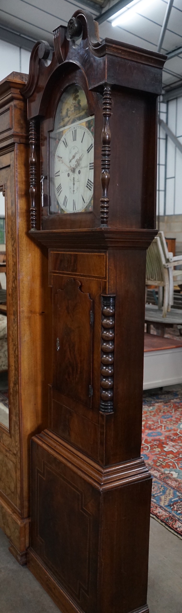 A Victorian mahogany eight day longcase clock marked Bates, Huddersfield